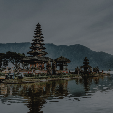 Iconic Bali temple surrounded by water, representing tropical event venues and wedding destinations by The Ego.
